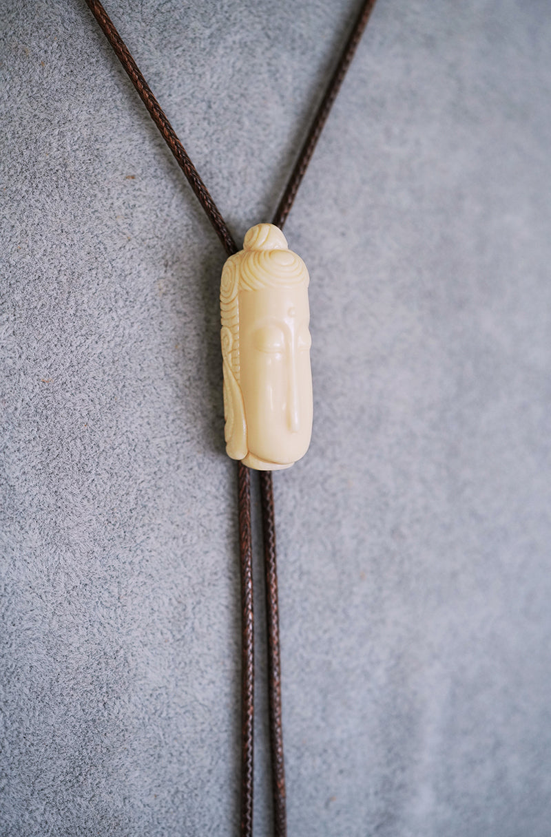Hand-Carved Mammoth Ivory Bolo Tie - The Zen Awakening: Minimalist Buddha
