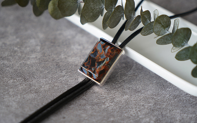 The Contained Tempest: Premium Rectangular Pietersite Solid Silver Bolo Tie