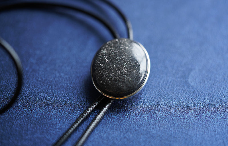 The Cosmic Dark:Natural Black Sunstone Sterling Silver Bezel Bolo Tie