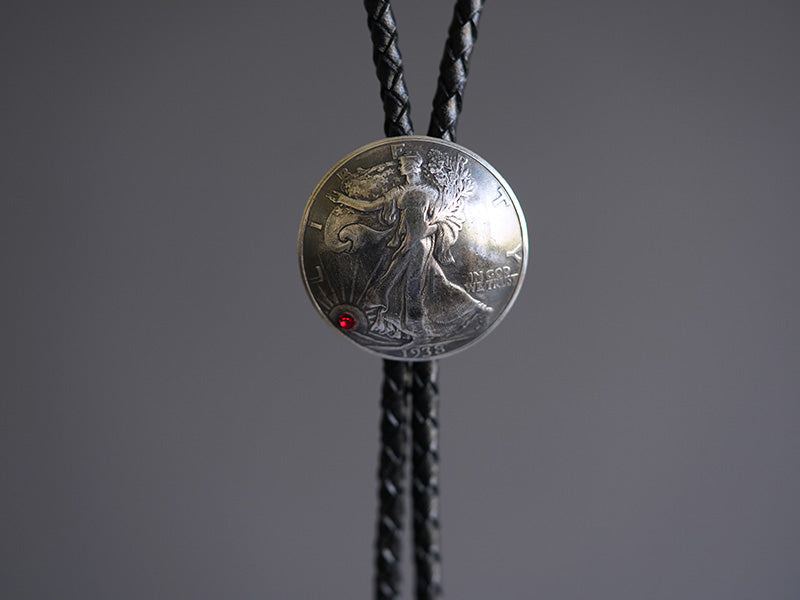 Walking Into the Dawn: 1940's Walking Liberty 90 Silver Coin Bolo Tie
