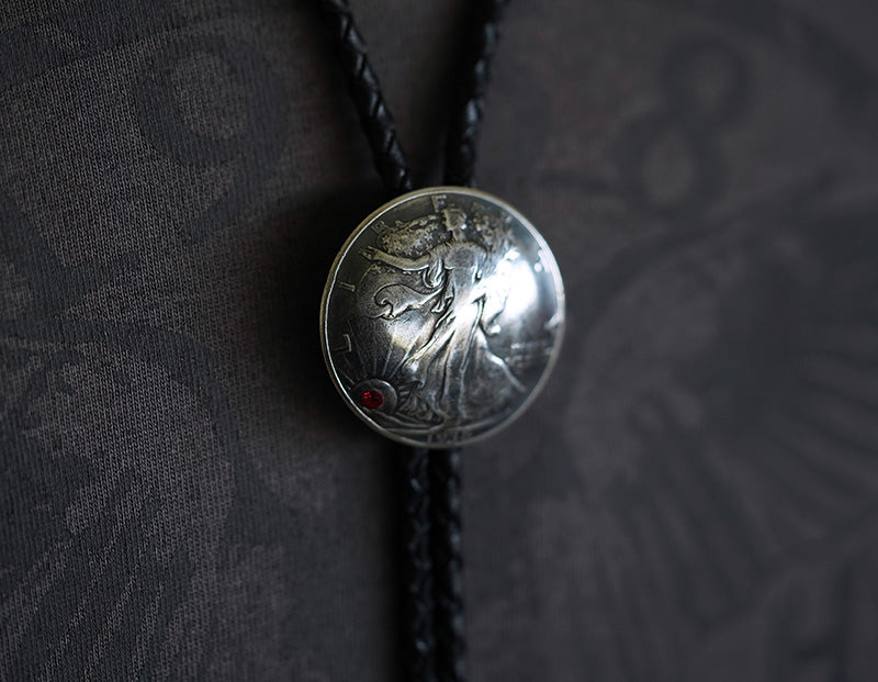 Walking Into the Dawn: 1940's Walking Liberty 90 Silver Coin Bolo Tie