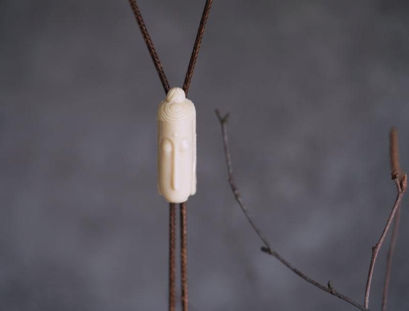 Hand-Carved Mammoth Ivory Bolo Tie - The Zen Awakening: Minimalist Buddha