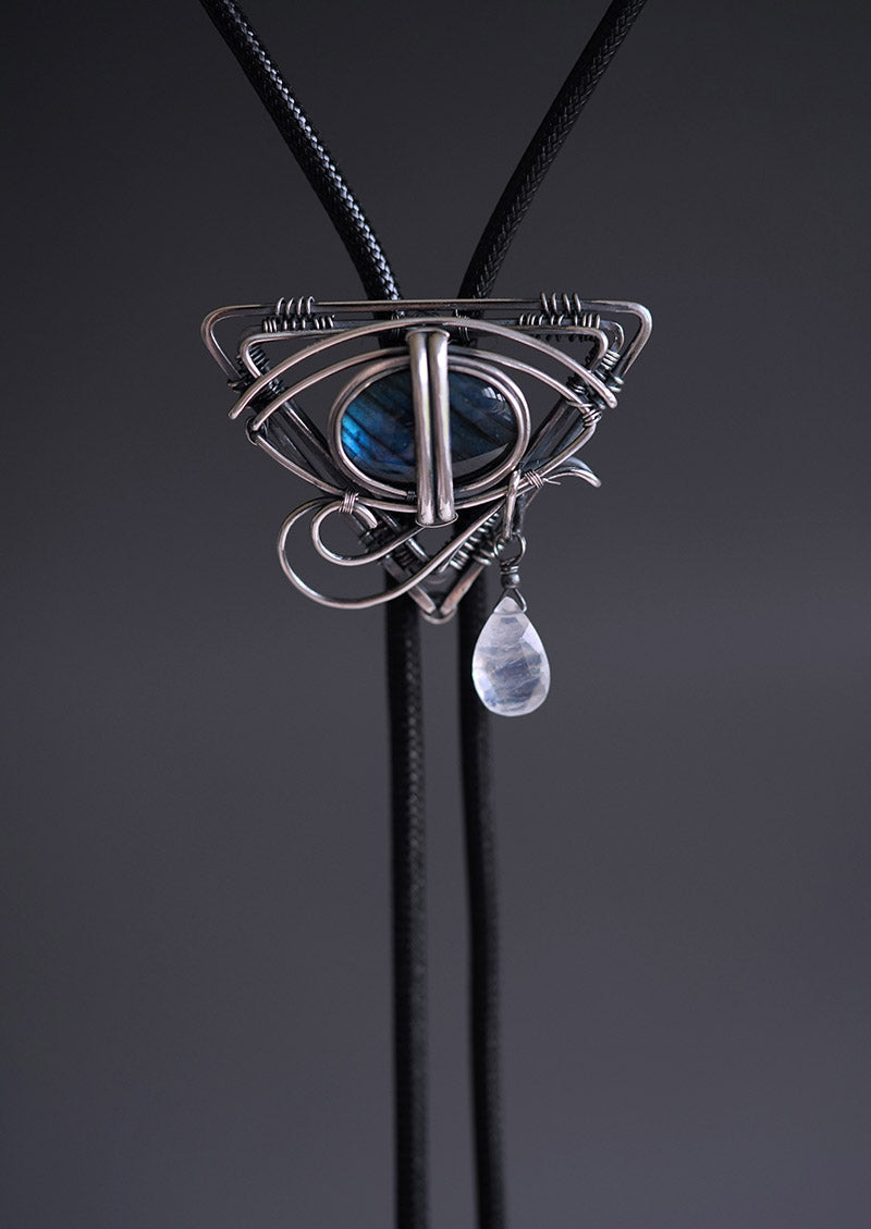 The Eye of Horus: Hand-Woven Sterling Silver Labradorite Bolo Tie