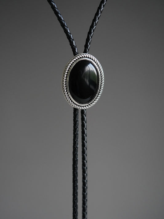 The Obsidian Eclipse · S999 Fine Silver Twisted Rope Bolo Tie