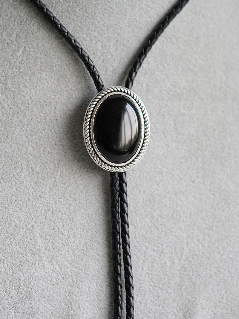 The Obsidian Eclipse · S999 Fine Silver Twisted Rope Bolo Tie