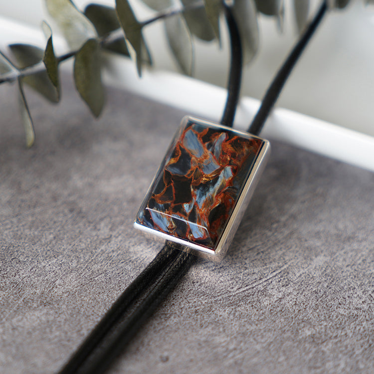 The Contained Tempest: Premium Rectangular Pietersite Solid Silver Bolo Tie