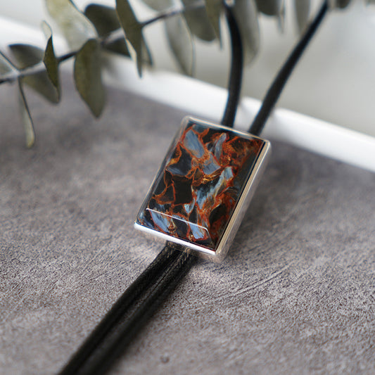 Artical Heart The Contained Tempest: Premium Rectangular Pietersite Solid Silver Bolo Tie