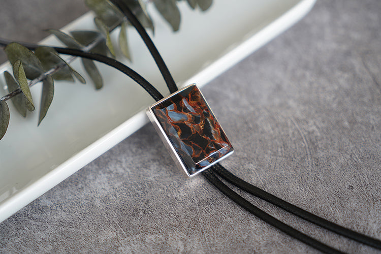 The Contained Tempest: Premium Rectangular Pietersite Solid Silver Bolo Tie