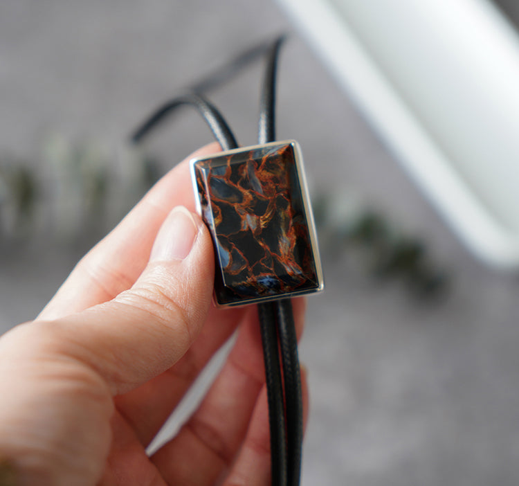 The Contained Tempest: Premium Rectangular Pietersite Solid Silver Bolo Tie