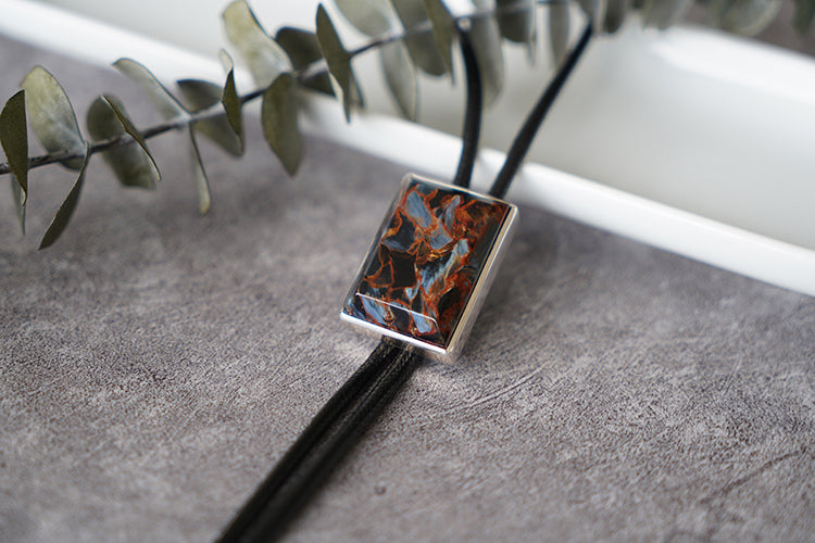 The Contained Tempest: Premium Rectangular Pietersite Solid Silver Bolo Tie
