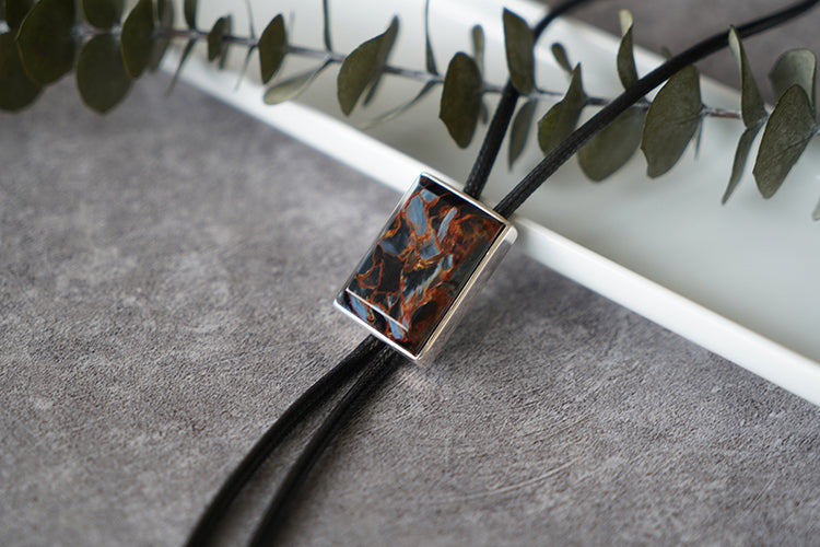 The Contained Tempest: Premium Rectangular Pietersite Solid Silver Bolo Tie