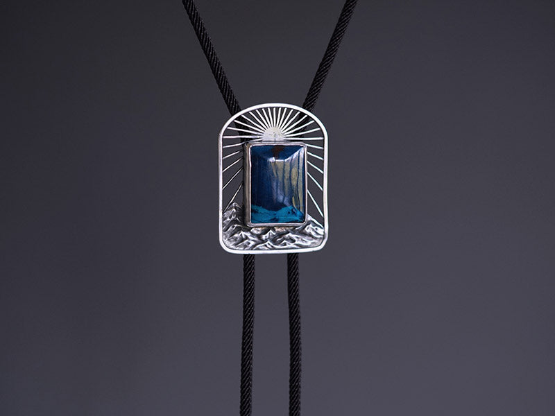Artical Heart “The Ridge Sunrise” Natural Phoenix Stone & Silver Bolo Tie