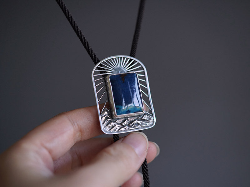 Artical Heart “The Ridge Sunrise” Natural Phoenix Stone & Silver Bolo Tie