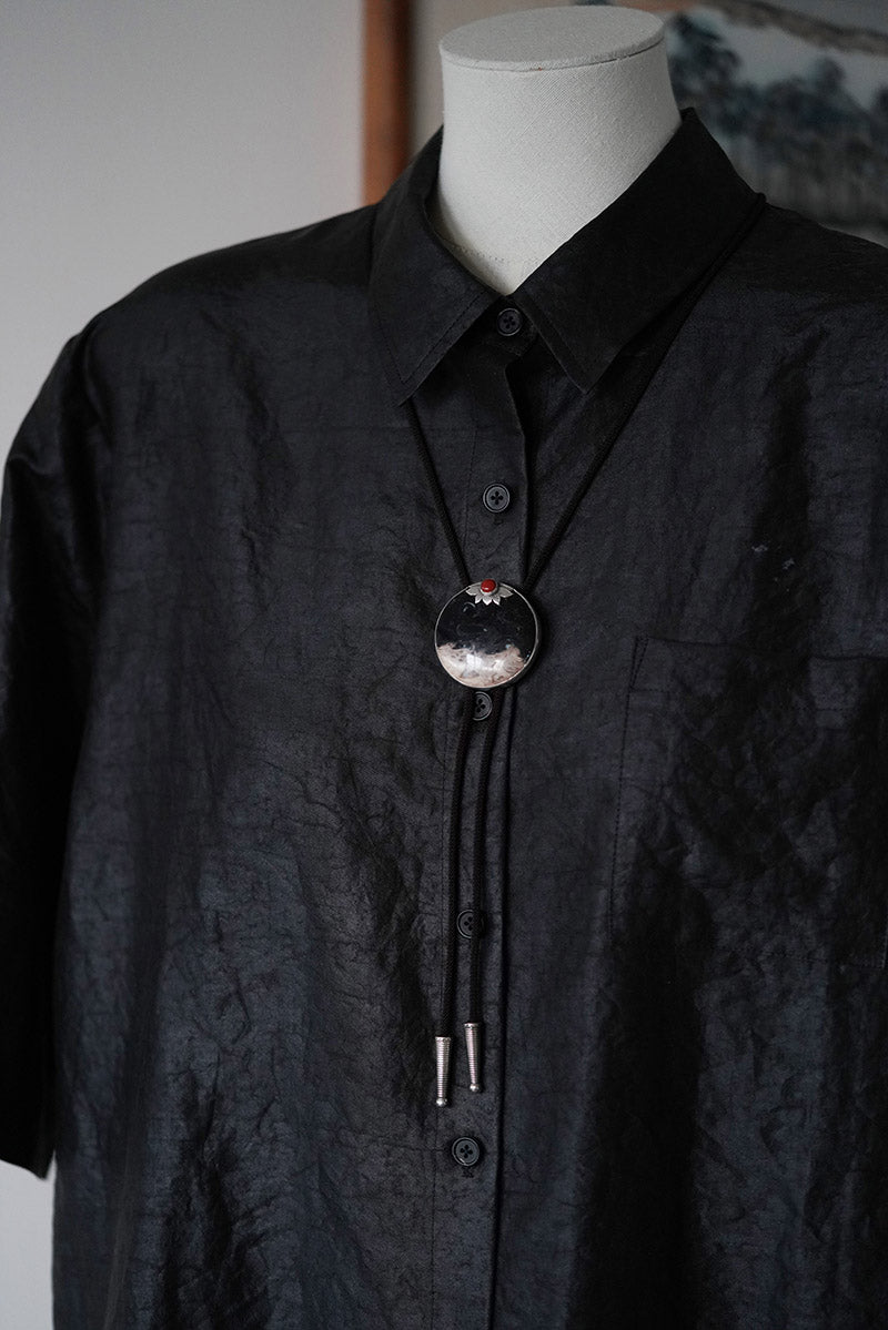 “The Solitary Sun” Handcrafted Silver & Palm Root Fossils Bolo Tie