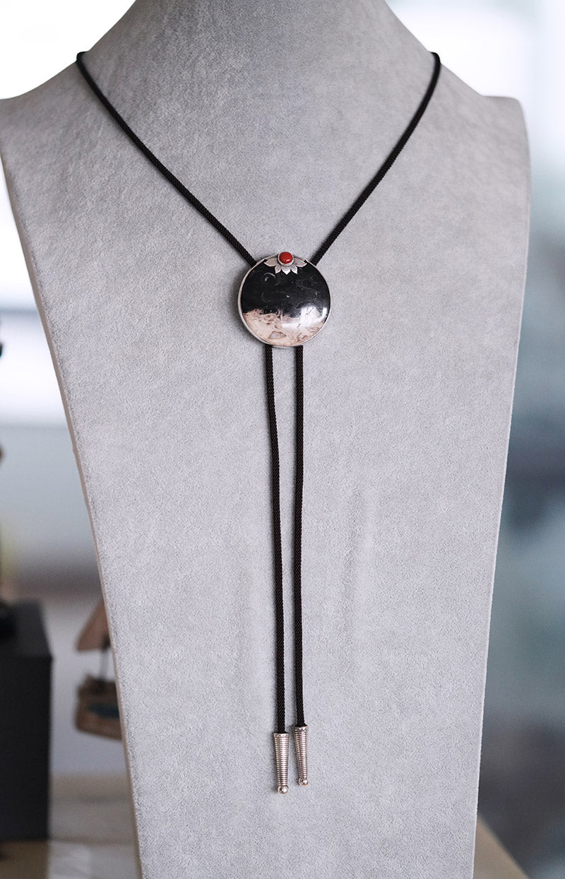 “The Solitary Sun” Handcrafted Silver & Palm Root Fossils Bolo Tie