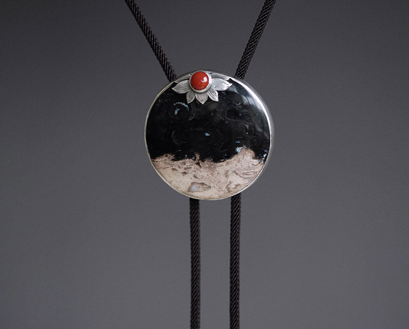 “The Solitary Sun” Handcrafted Silver & Palm Root Fossils Bolo Tie