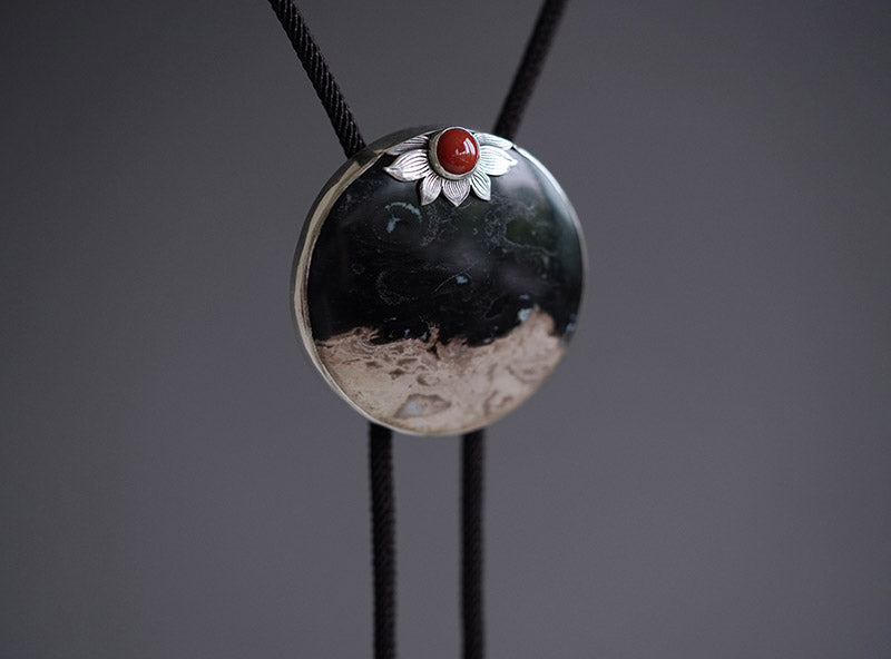 “The Solitary Sun” Handcrafted Silver & Palm Root Fossils Bolo Tie