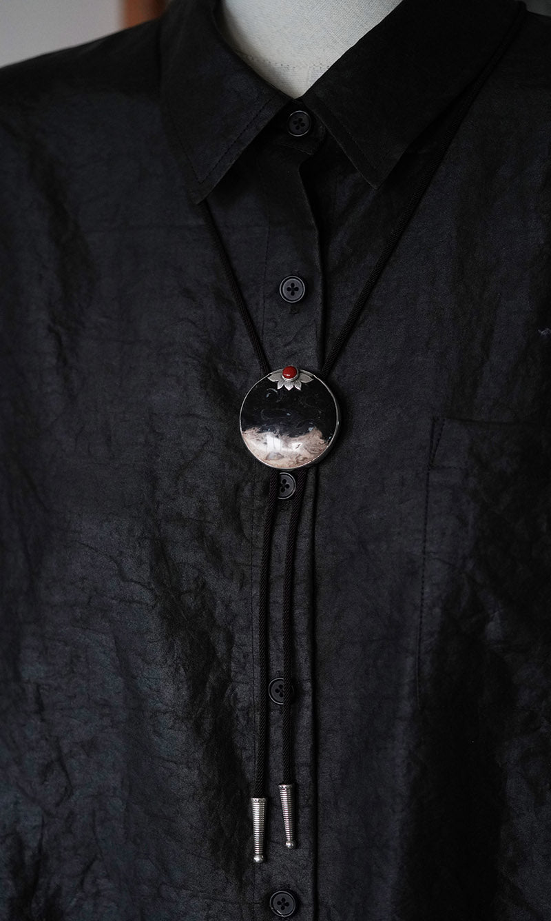 “The Solitary Sun” Handcrafted Silver & Palm Root Fossils Bolo Tie