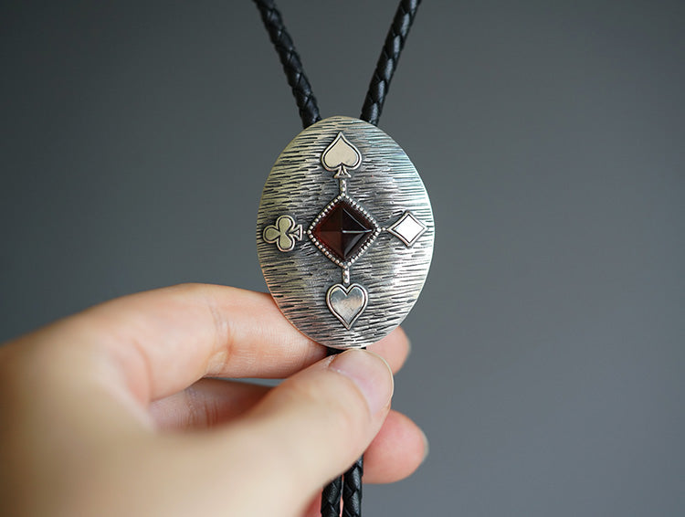 ”The Sovereign Gambit“ Silver & Sugarloaf Garnet Gemstone Bolo Tie