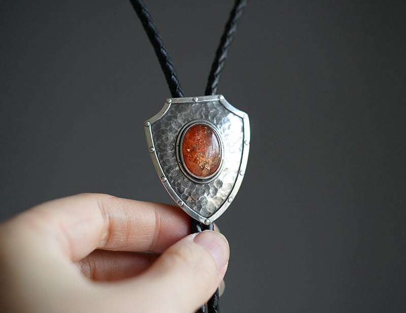 The Relentless Shield-One-of-a-Kind Hammered Solid Silver Sunstone Bolo Tie