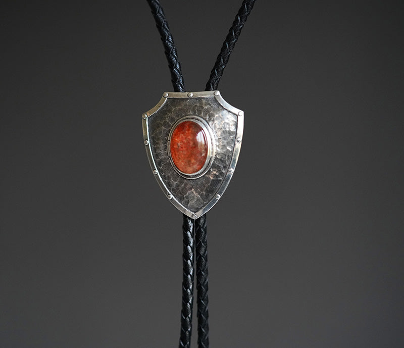 The Relentless Shield-One-of-a-Kind Hammered Solid Silver Sunstone Bolo Tie