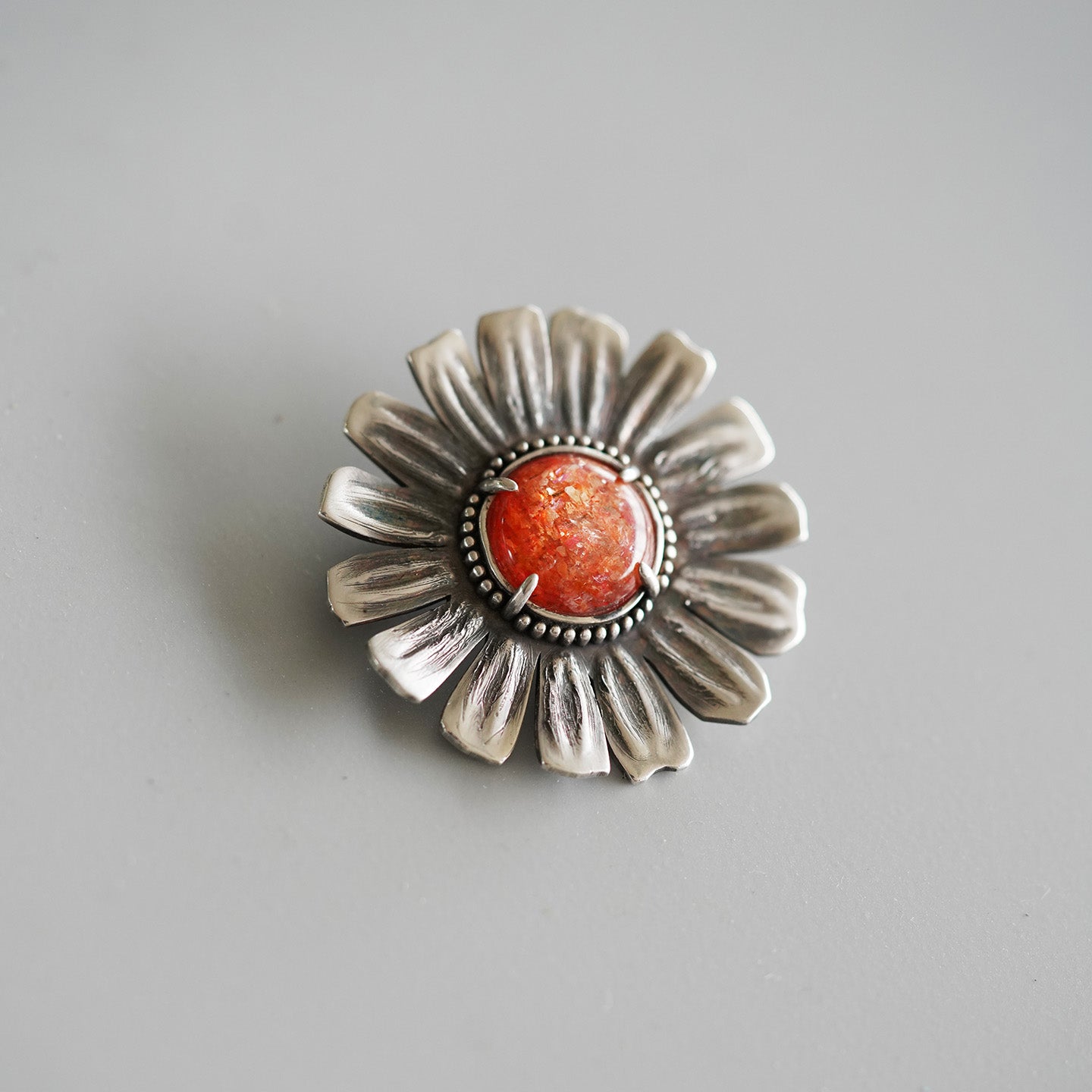 handcrafts brooch with sunstone