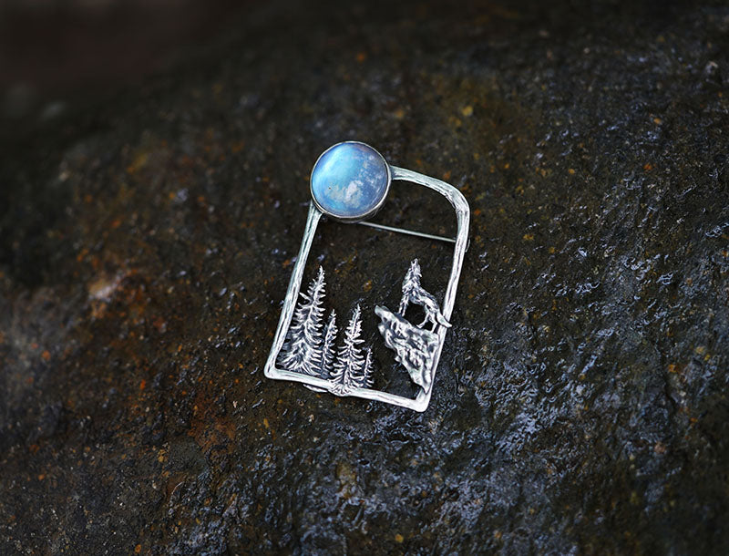silver brooch with moonstone