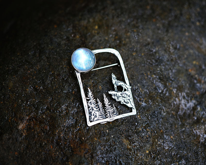 silver wolf brooch with moonstone