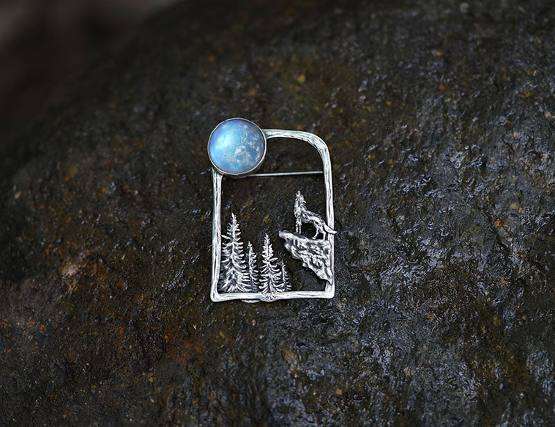 wolf under moon brooch with moonstone